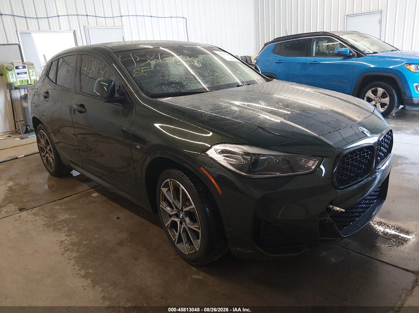 2023 BMW X2 VIN WBXYJ1C07P5V74452 — IAAI salvage auction photo
