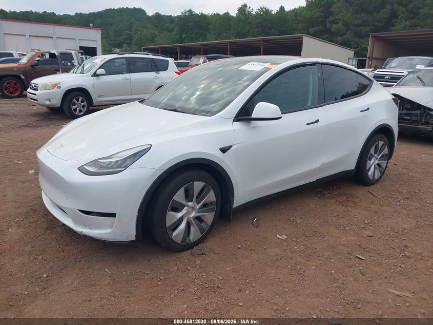 2023 Tesla Model y VIN 7SAYGDEE6PA146554 IAAI salvage auction — LEFT FRONT, Wait Title, sold $14,300 on 2026-09-03 (photo 2)