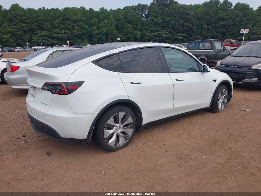 2023 Tesla Model y VIN 7SAYGDEE6PA146554 IAAI salvage auction — LEFT FRONT, Wait Title, sold $14,300 on 2026-09-03 (photo 4)