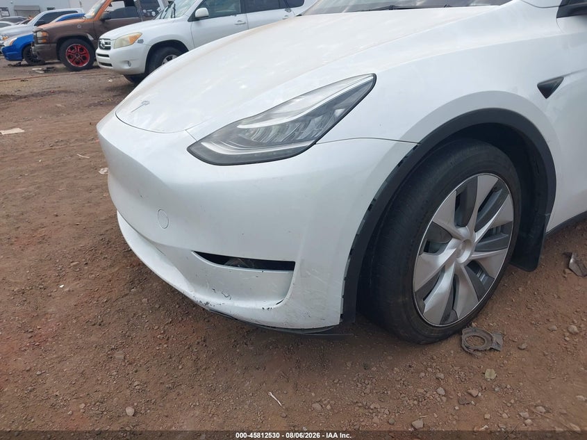 2023 Tesla Model y VIN 7SAYGDEE6PA146554 IAAI salvage auction — LEFT FRONT, Wait Title, sold $14,300 on 2026-09-03 (photo 6)