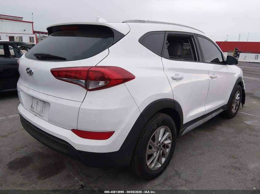 2018 Hyundai Tucson VIN KM8J33A40JU670300 IAAI salvage auction — THEFT, Wait Title, sold $2,150 on 2026-10-05 (photo 4)