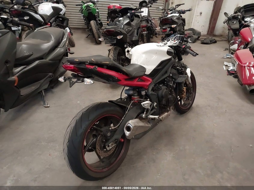 2014 Triumph motorcycle Street VIN SMTL03NEXET625399 IAAI salvage auction — THEFT, Salvage (California), sold $850 on 2026-09-10 (photo 4)