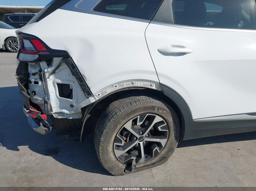 2023 Kia Sportage VIN 5XYK33AF7PG059782 IAAI salvage auction — REAR END, Wait Title, sold $7,550 on 2026-10-14 (photo 6)