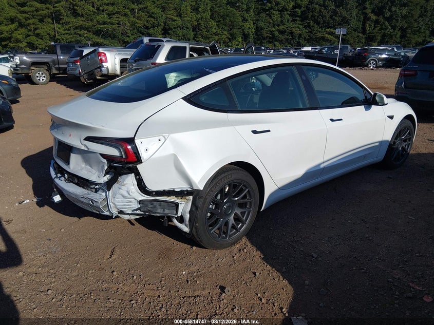 2025 Tesla Model 3 VIN 5YJ3E1EA9SF950724 IAAI salvage auction — REAR END, Salvage Title, sold $16,975 on 2026-09-04 (photo 4)