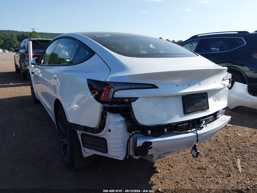 2025 Tesla Model 3 VIN 5YJ3E1EA9SF950724 IAAI salvage auction — REAR END, Salvage Title, sold $16,975 on 2026-09-04 (photo 6)