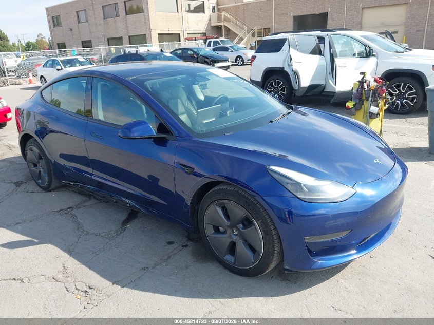 2022 Tesla Model 3 VIN 5YJ3E1EB8NF317533 IAAI salvage auction — LEFT SIDE, Salvage Title, sold $9,400 on 2026-10-08 (photo 1)