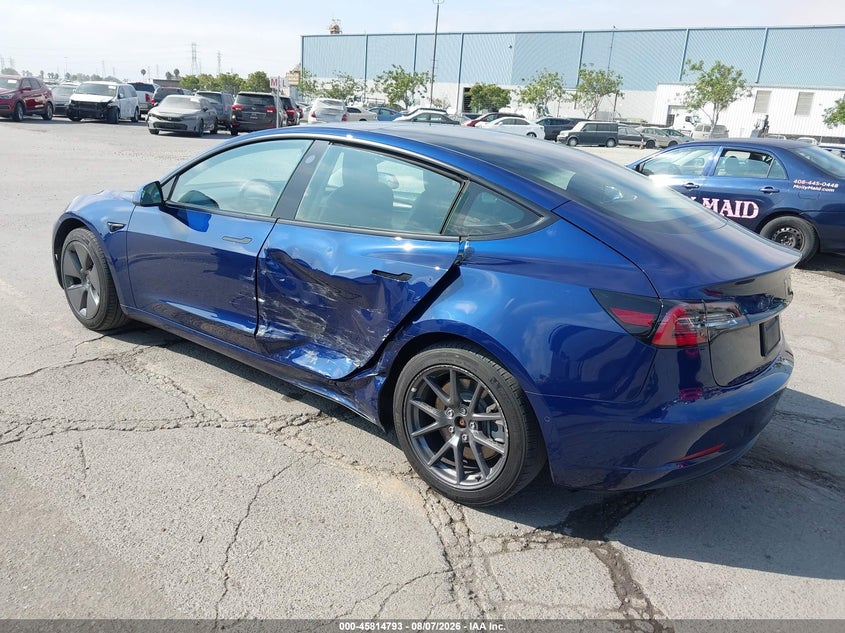 2022 Tesla Model 3 VIN 5YJ3E1EB8NF317533 IAAI salvage auction — LEFT SIDE, Salvage Title, sold $9,400 on 2026-10-08 (photo 3)