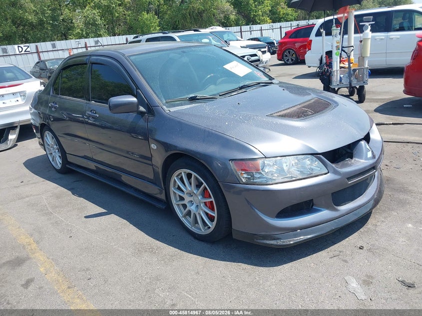 2005 Mitsubishi Lancer evolution VIN JA3AH86D65U031483 — IAAI salvage auction photo