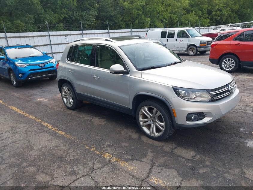 2013 Volkswagen Tiguan VIN WVGBV3AX9DW624160 IAAI salvage auction — NORMAL WEAR, Clear (Michigan), sold $1,300 on 2026-08-17 (photo 1)