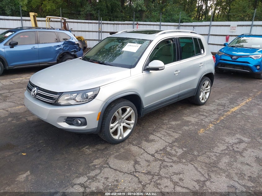 2013 Volkswagen Tiguan VIN WVGBV3AX9DW624160 IAAI salvage auction — NORMAL WEAR, Clear (Michigan), sold $1,300 on 2026-08-17 (photo 2)