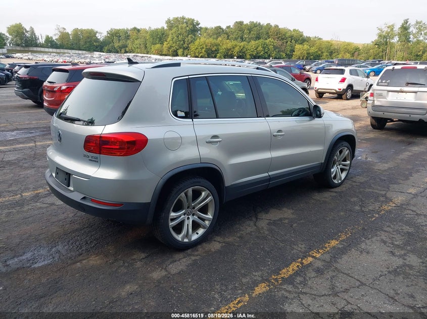 2013 Volkswagen Tiguan VIN WVGBV3AX9DW624160 IAAI salvage auction — NORMAL WEAR, Clear (Michigan), sold $1,300 on 2026-08-17 (photo 4)