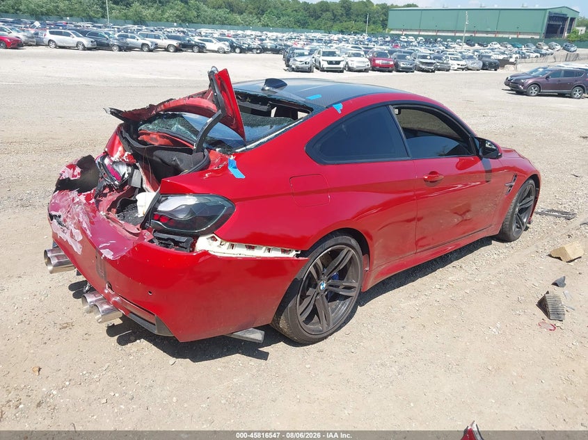 2016 BMW M4 VIN WBS3R9C54GK335834 IAAI salvage auction — Rear, Salvage, sold $13,000 on 2026-09-08 (photo 4)