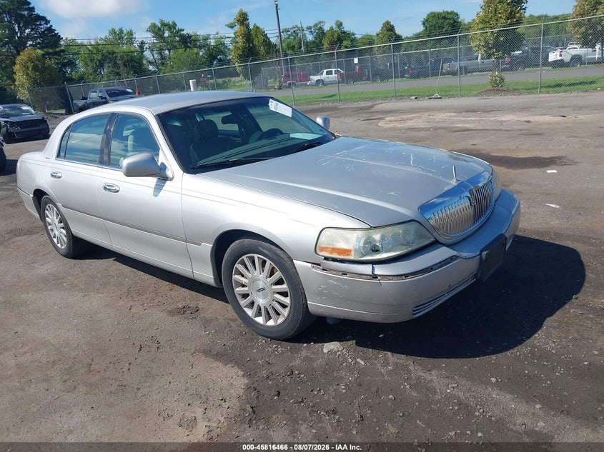 2003 Lincoln TOWN CAR VIN 1LNHM82W13Y705334 IAAI salvage auction — FRONT END, Clear (Virginia), sold $1,250 on 2026-09-06 (photo 1)