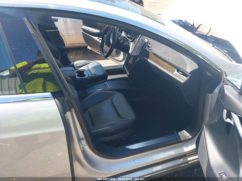 2016 Tesla Model s VIN 5YJSA1E20GF131723 IAAI salvage auction — WATER/FLOOD, Wait Title, sold $3,500 on 2026-09-11 (photo 5)
