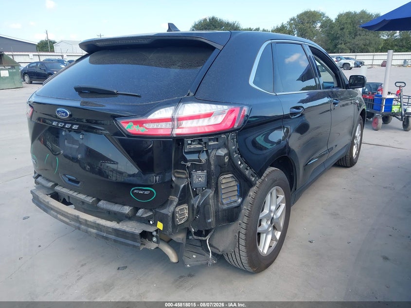 2023 Ford Edge VIN 2FMPK4J91PBA56076 IAAI salvage auction — REAR END, Salvage Title, sold $12,100 on 2026-08-18 (photo 4)