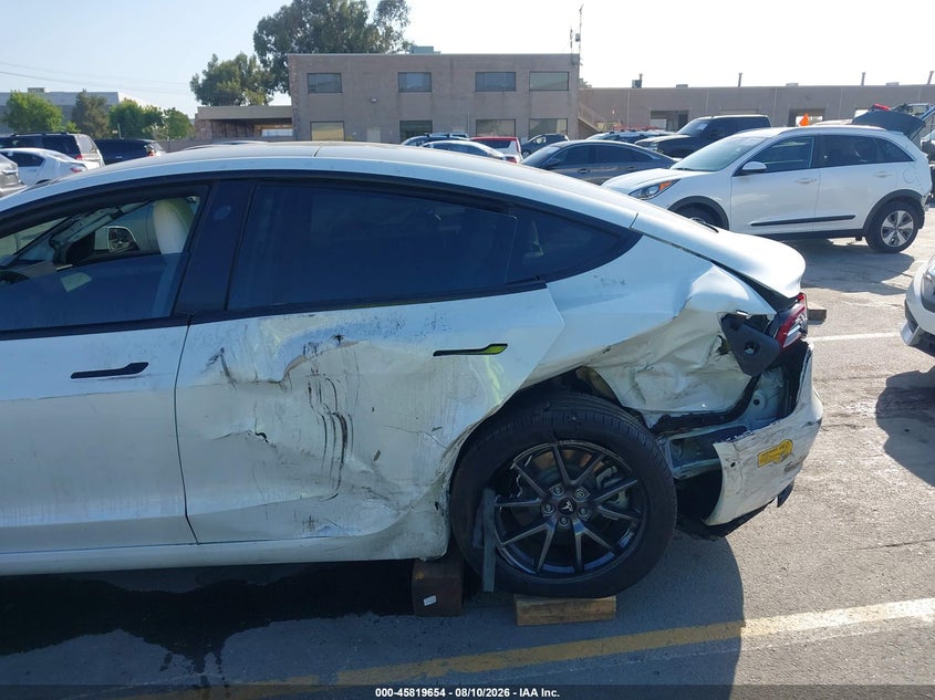 2022 Tesla Model 3 VIN 5YJ3E1EAXNF147974 IAAI salvage auction — SIDE, Salvage (California), sold $4,250 on 2026-08-30 (photo 6)