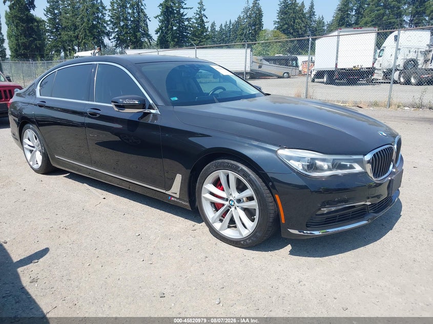 2018 BMW 7er VIN WBA7F2C51JG424633 IAAI salvage auction — NORMAL WEAR, Clear (Washington), sold $3,750 on 2026-08-26 (photo 1)
