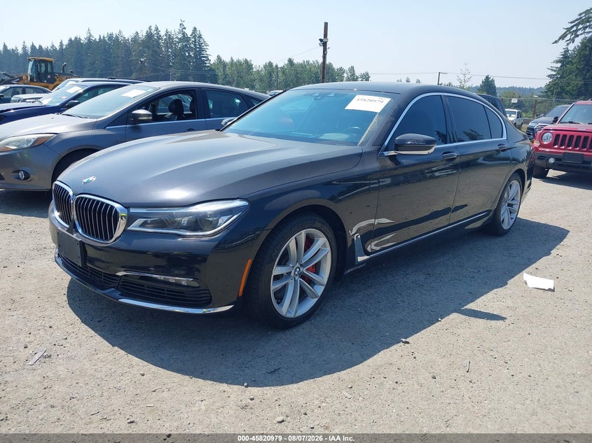2018 BMW 7er VIN WBA7F2C51JG424633 IAAI salvage auction — NORMAL WEAR, Clear (Washington), sold $3,750 on 2026-08-26 (photo 2)