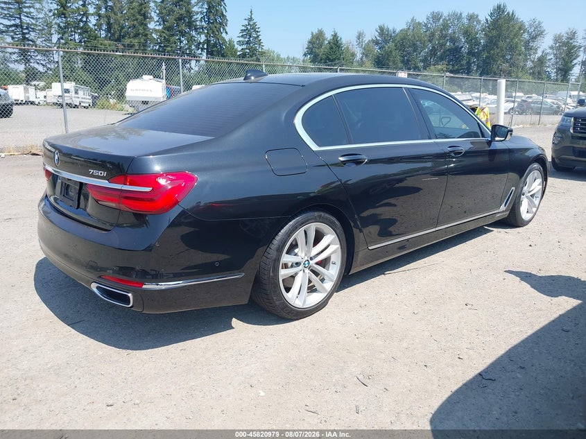 2018 BMW 7er VIN WBA7F2C51JG424633 IAAI salvage auction — NORMAL WEAR, Clear (Washington), sold $3,750 on 2026-08-26 (photo 4)
