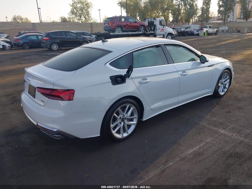 2023 Audi A5 VIN WAUFACF53PA021941 IAAI salvage auction — SIDE, Wait Title, sold $9,800 on 2026-10-23 (photo 4)
