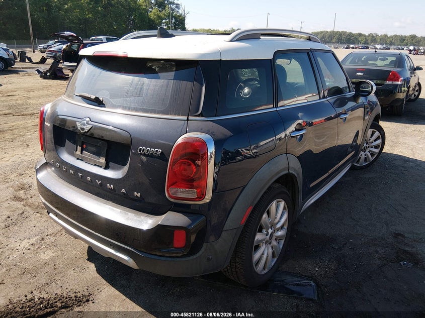 2017 Mini Countryman VIN WMZYS7C33H3B62889 IAAI salvage auction — NORMAL WEAR, Clear (Virginia), sold $3,300 on 2026-08-12 (photo 4)
