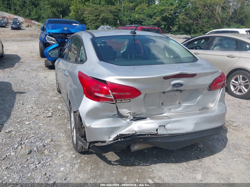 2016 Ford Focus VIN 1FADP3F2XGL310856 IAAI salvage auction — REAR END, Wait Title, sold $800 on 2026-10-20 (photo 3)