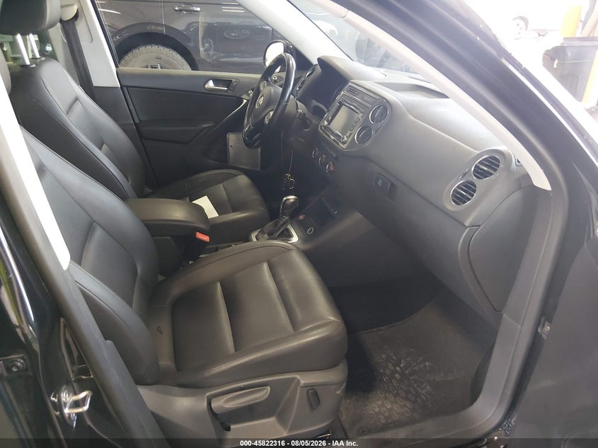 2014 Volkswagen Tiguan VIN WVGBV3AX2EW568984 IAAI salvage auction — LEFT SIDE, Previously Damaged (North Dakota), sold $1,050 on 2026-08-13 (photo 5)