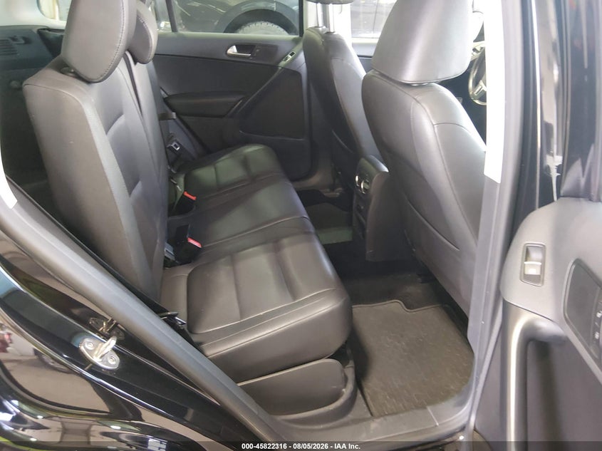 2014 Volkswagen Tiguan VIN WVGBV3AX2EW568984 IAAI salvage auction — LEFT SIDE, Previously Damaged (North Dakota), sold $1,050 on 2026-08-13 (photo 8)
