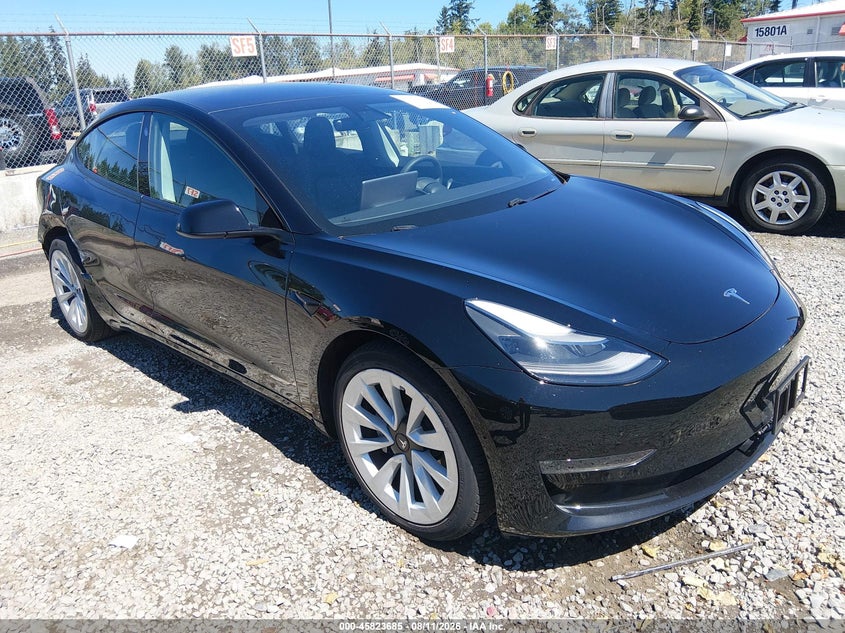 2021 Tesla Model 3 VIN 5YJ3E1EB7MF063148 — IAAI salvage auction photo