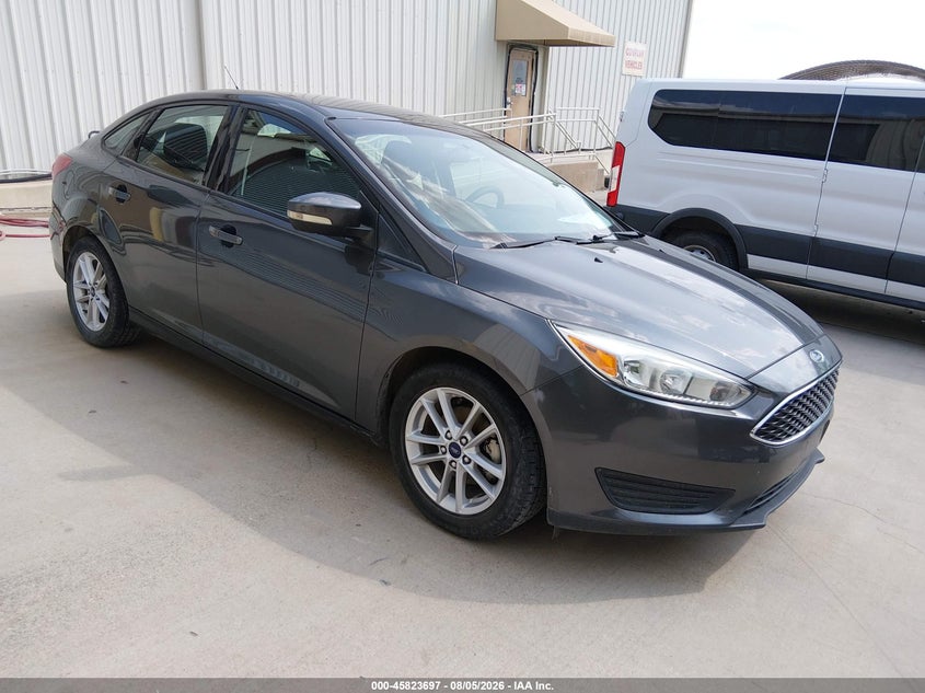 2016 Ford Focus VIN 1FADP3F21GL365938 — IAAI salvage auction photo