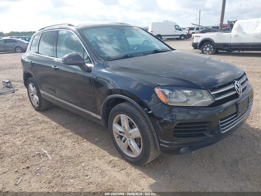 2012 Volkswagen Touareg VIN WVGEF9BP0CD011141 IAAI salvage auction — NORMAL WEAR, Original (Texas), sold $25 on 2026-08-13 (photo 1)
