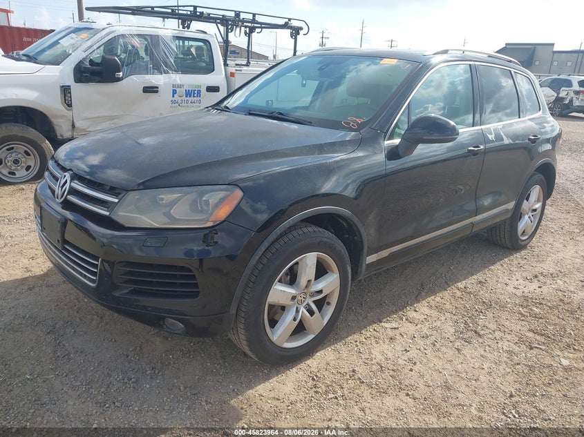 2012 Volkswagen Touareg VIN WVGEF9BP0CD011141 IAAI salvage auction — NORMAL WEAR, Original (Texas), sold $25 on 2026-08-13 (photo 2)