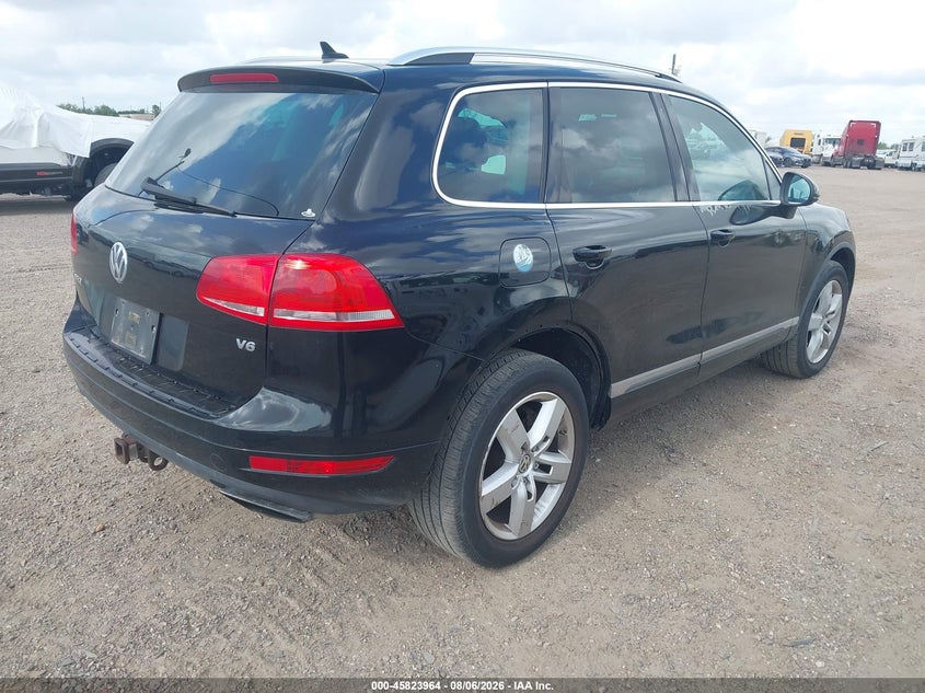 2012 Volkswagen Touareg VIN WVGEF9BP0CD011141 IAAI salvage auction — NORMAL WEAR, Original (Texas), sold $25 on 2026-08-13 (photo 4)