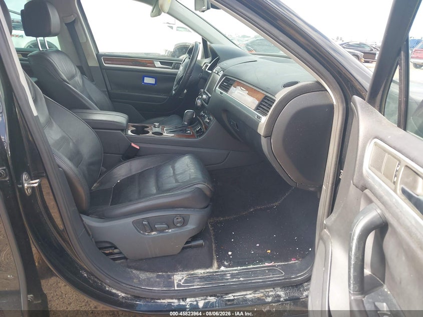 2012 Volkswagen Touareg VIN WVGEF9BP0CD011141 IAAI salvage auction — NORMAL WEAR, Original (Texas), sold $25 on 2026-08-13 (photo 5)