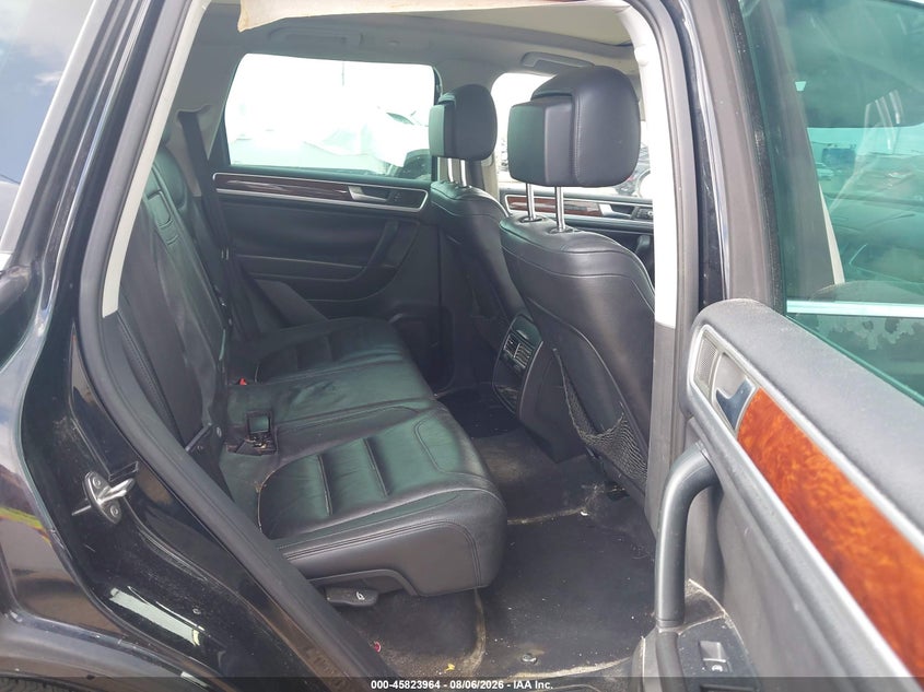 2012 Volkswagen Touareg VIN WVGEF9BP0CD011141 IAAI salvage auction — NORMAL WEAR, Original (Texas), sold $25 on 2026-08-13 (photo 8)