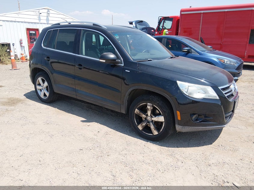 2010 Volkswagen Tiguan VIN WVGBV7AX1AW514058 IAAI salvage auction — NORMAL WEAR, Clear (Colorado), sold $50 on 2026-08-12 (photo 1)