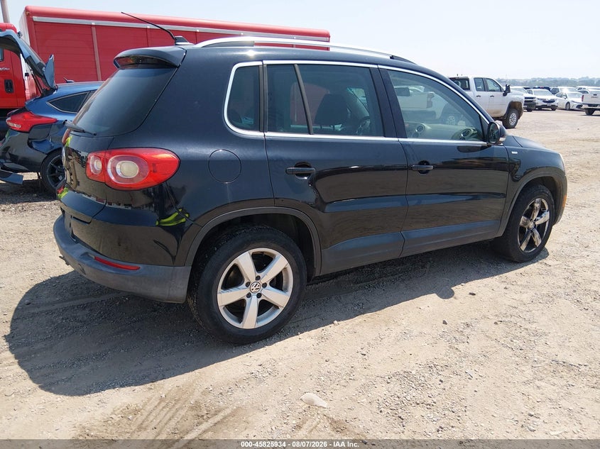 2010 Volkswagen Tiguan VIN WVGBV7AX1AW514058 IAAI salvage auction — NORMAL WEAR, Clear (Colorado), sold $50 on 2026-08-12 (photo 4)