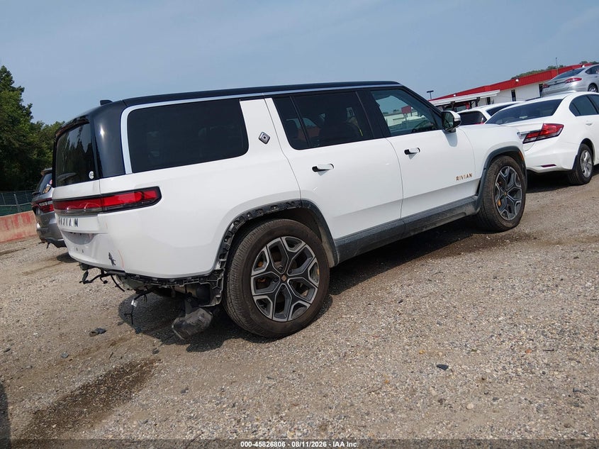 2023 Rivian R1s VIN 7PDSGABL1PN006297 IAAI salvage auction — REAR END, Wait Title, sold $18,100 on 2026-10-02 (photo 4)