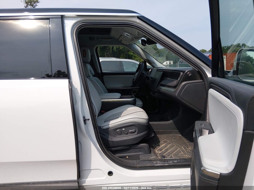 2023 Rivian R1s VIN 7PDSGABL1PN006297 IAAI salvage auction — REAR END, Wait Title, sold $18,100 on 2026-10-02 (photo 5)