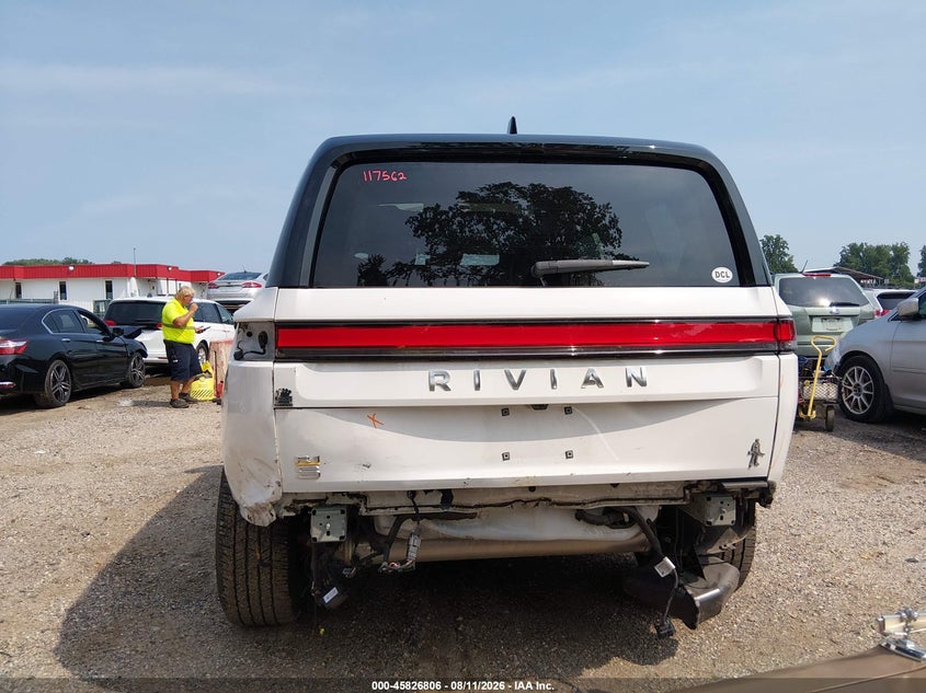 2023 Rivian R1s VIN 7PDSGABL1PN006297 IAAI salvage auction — REAR END, Wait Title, sold $18,100 on 2026-10-02 (photo 6)