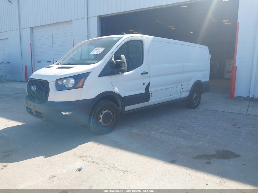 2021 Ford Transit-250 VIN 1FTBR1Y84MKA53390 IAAI salvage auction — LEFT SIDE, Clear (Florida), sold $9,250 on 2026-08-19 (photo 2)