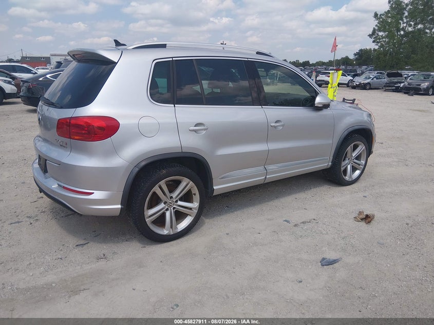 2015 Volkswagen Tiguan VIN WVGBV7AX4FW084677 IAAI salvage auction — NORMAL WEAR, Salvage Title, sold $1,900 on 2026-08-18 (photo 4)