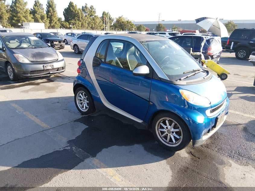 2009 Smart Fortwo VIN WMEEJ31X59K211522 IAAI salvage auction — REAR END, Salvage (California), sold $825 on 2026-08-14 (photo 1)