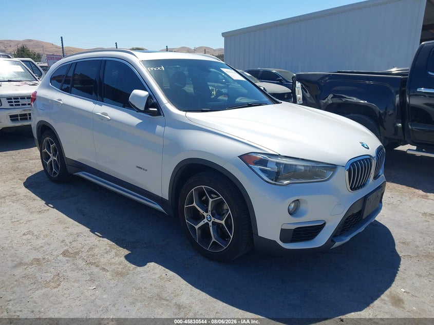 2016 BMW X1 VIN WBXHT3C3XG5F65571 IAAI salvage auction — SIDE, Wait Title, sold $4,400 on 2026-08-24 (photo 1)