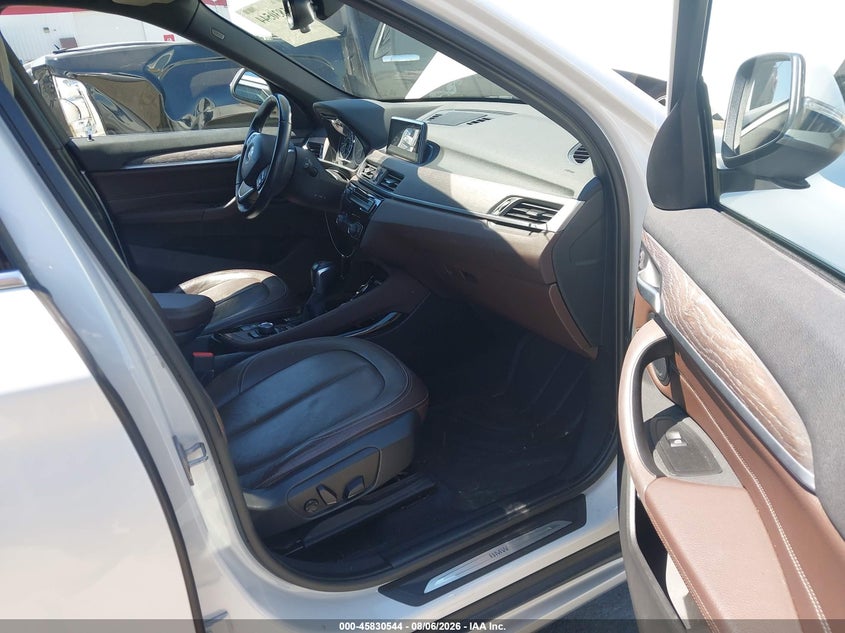 2016 BMW X1 VIN WBXHT3C3XG5F65571 IAAI salvage auction — SIDE, Wait Title, sold $4,400 on 2026-08-24 (photo 5)