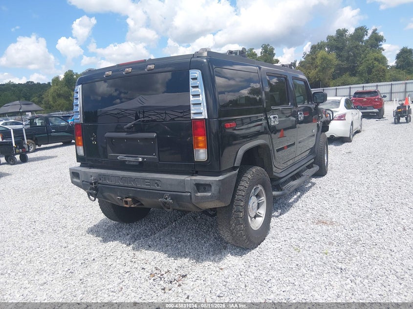 2003 Hummer H2 VIN 5GRGN23U13H148852 IAAI salvage auction — NORMAL WEAR, Clear (Montana), sold $1,450 on 2026-09-10 (photo 4)