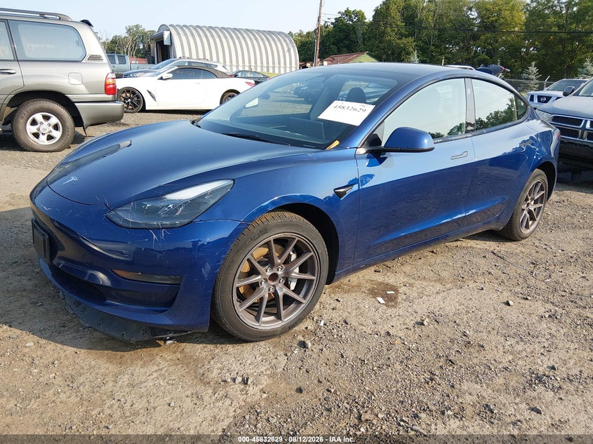 2023 Tesla Model 3 VIN 5YJ3E1EA7PF578341 IAAI salvage auction — WATER/FLOOD, Salvage Title, sold $6,900 on 2026-08-22 (photo 2)