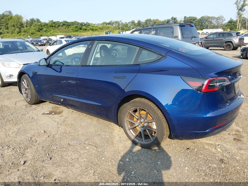 2023 Tesla Model 3 VIN 5YJ3E1EA7PF578341 IAAI salvage auction — WATER/FLOOD, Salvage Title, sold $6,900 on 2026-08-22 (photo 3)