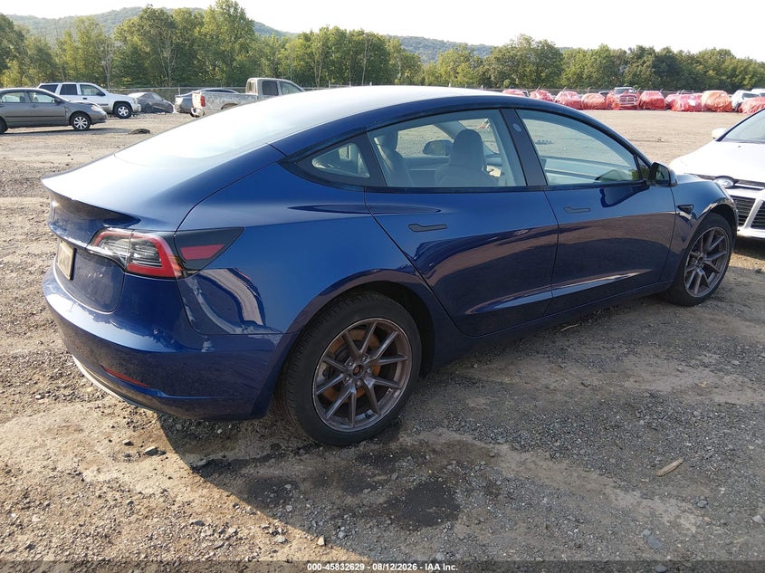 2023 Tesla Model 3 VIN 5YJ3E1EA7PF578341 IAAI salvage auction — WATER/FLOOD, Salvage Title, sold $6,900 on 2026-08-22 (photo 4)