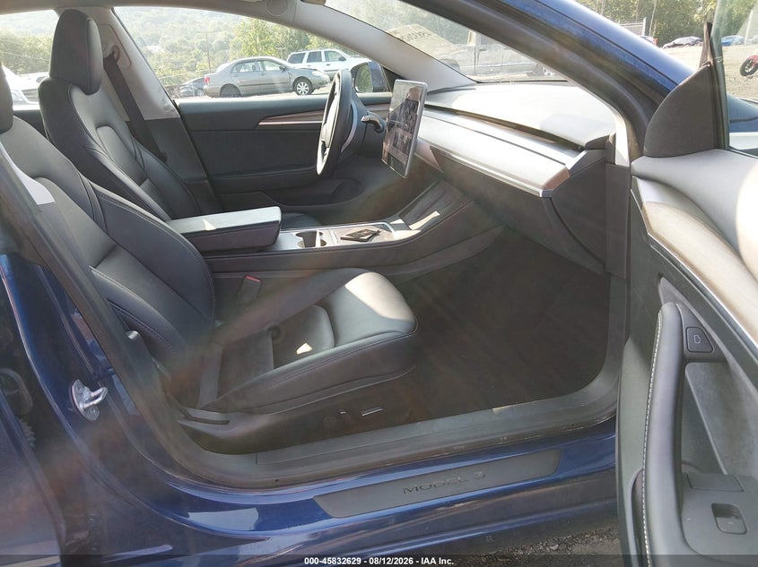 2023 Tesla Model 3 VIN 5YJ3E1EA7PF578341 IAAI salvage auction — WATER/FLOOD, Salvage Title, sold $6,900 on 2026-08-22 (photo 5)